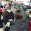 Подељена заштитна опрема на Зеленој пијаци и пакети старијим лицима